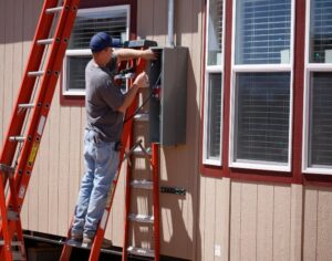 Electrician Fixing Electric Wires in a Mobile Home for Delta Electric in San Jose, CA